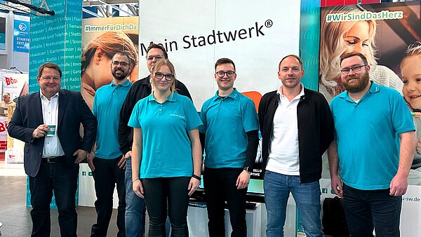 neu.sw Team am neu.sw Messestand.